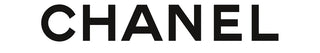 Black and white CHANEL logo in bold, modern font on white background
